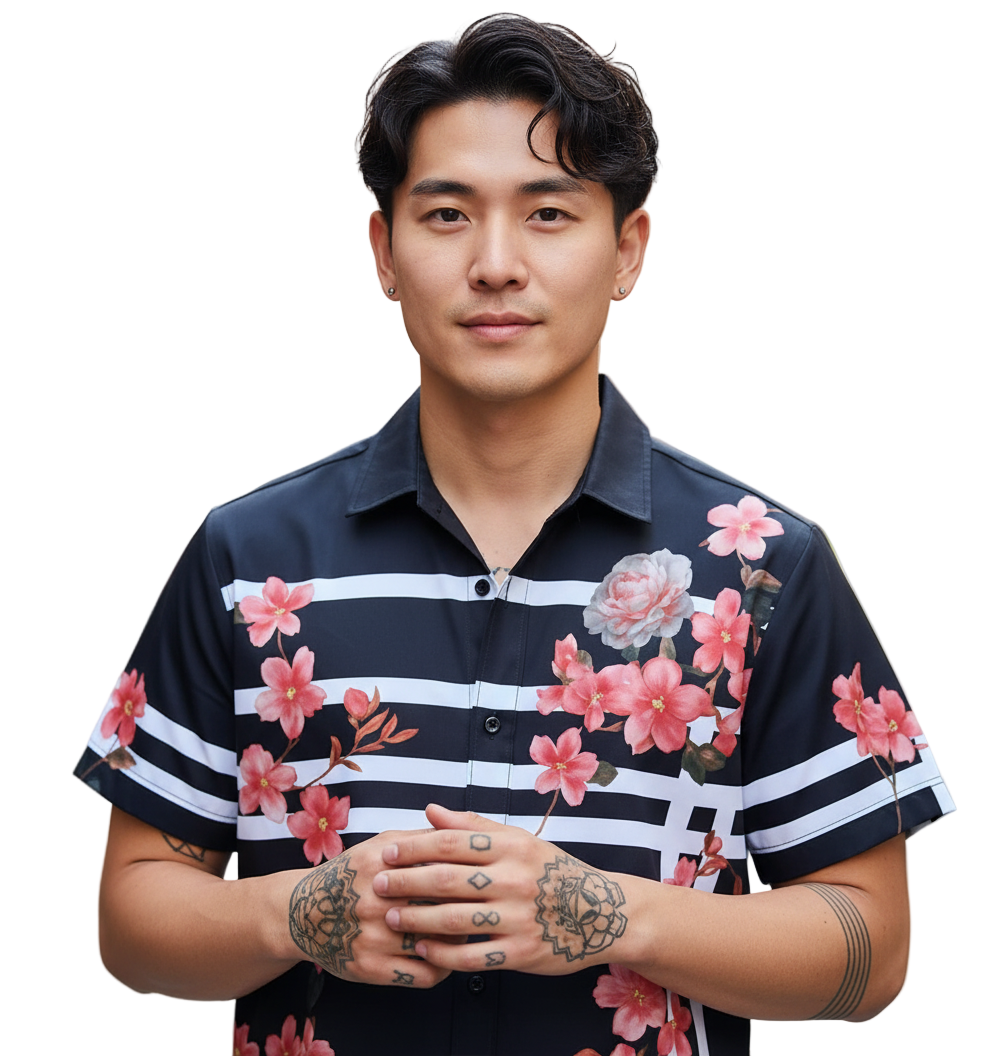 Man wearing a floral striped shirt standing on a street