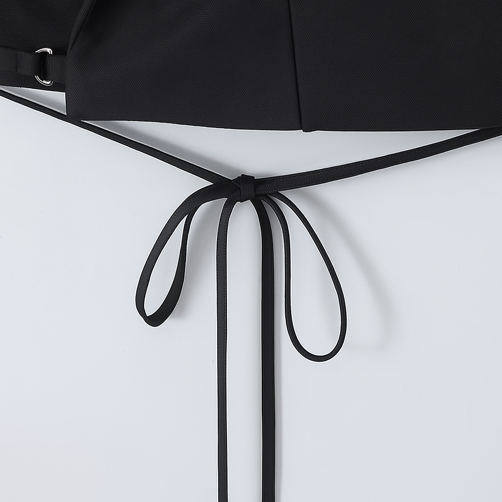 Black belt with a bow on a white background