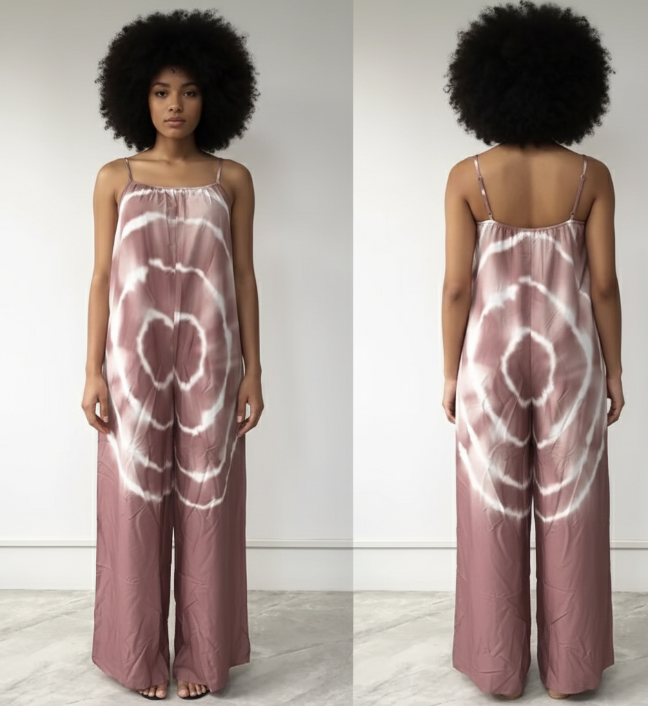 Woman wearing a tie-dye jumpsuit from front and back views on a plain background