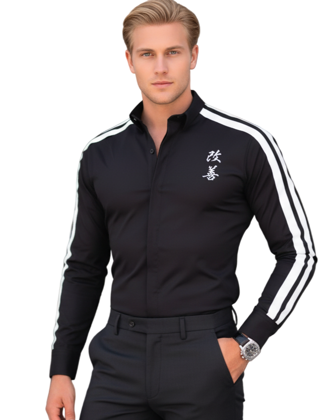 Man wearing a black outfit with white stripes in an urban setting