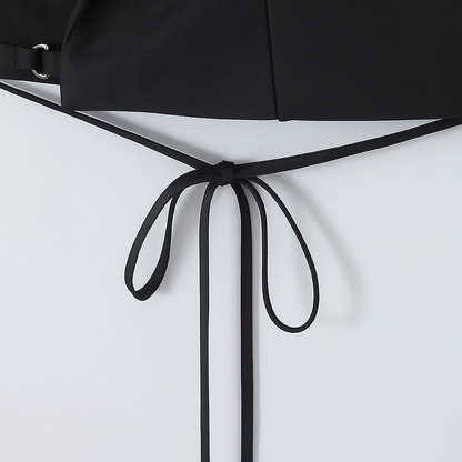 Black belt with a bow on a white background