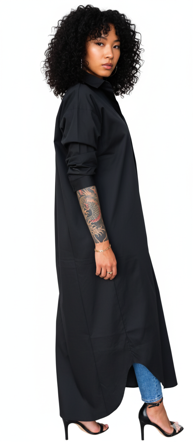 Woman wearing a long black dress with a white background