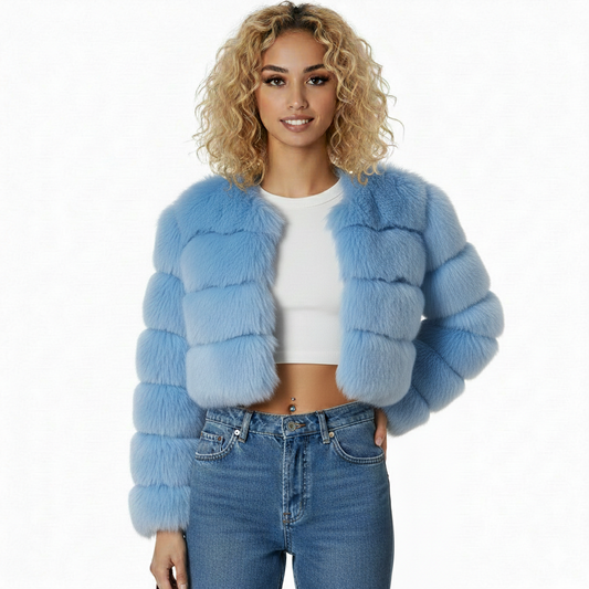 Woman wearing a light blue fur coat on a white background