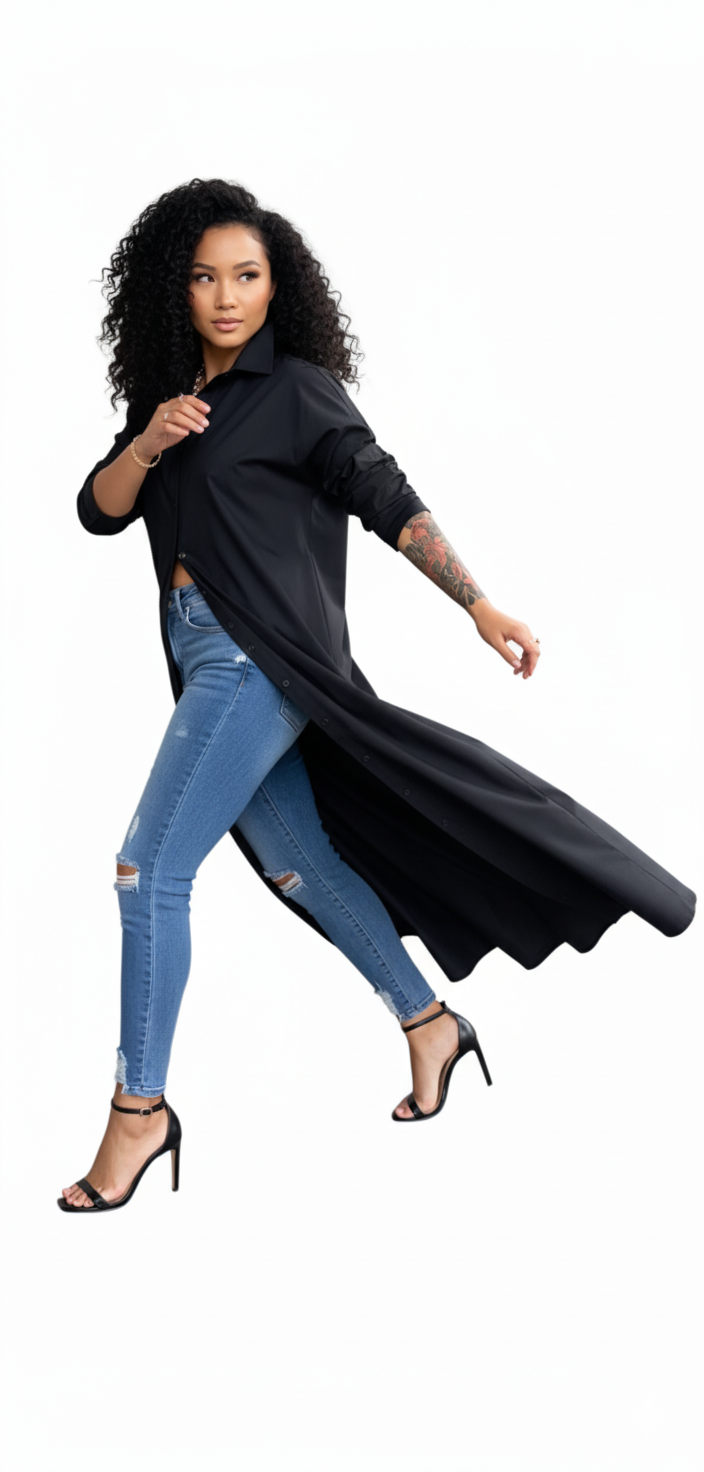 Woman wearing a long black shirt and blue jeans on a white background