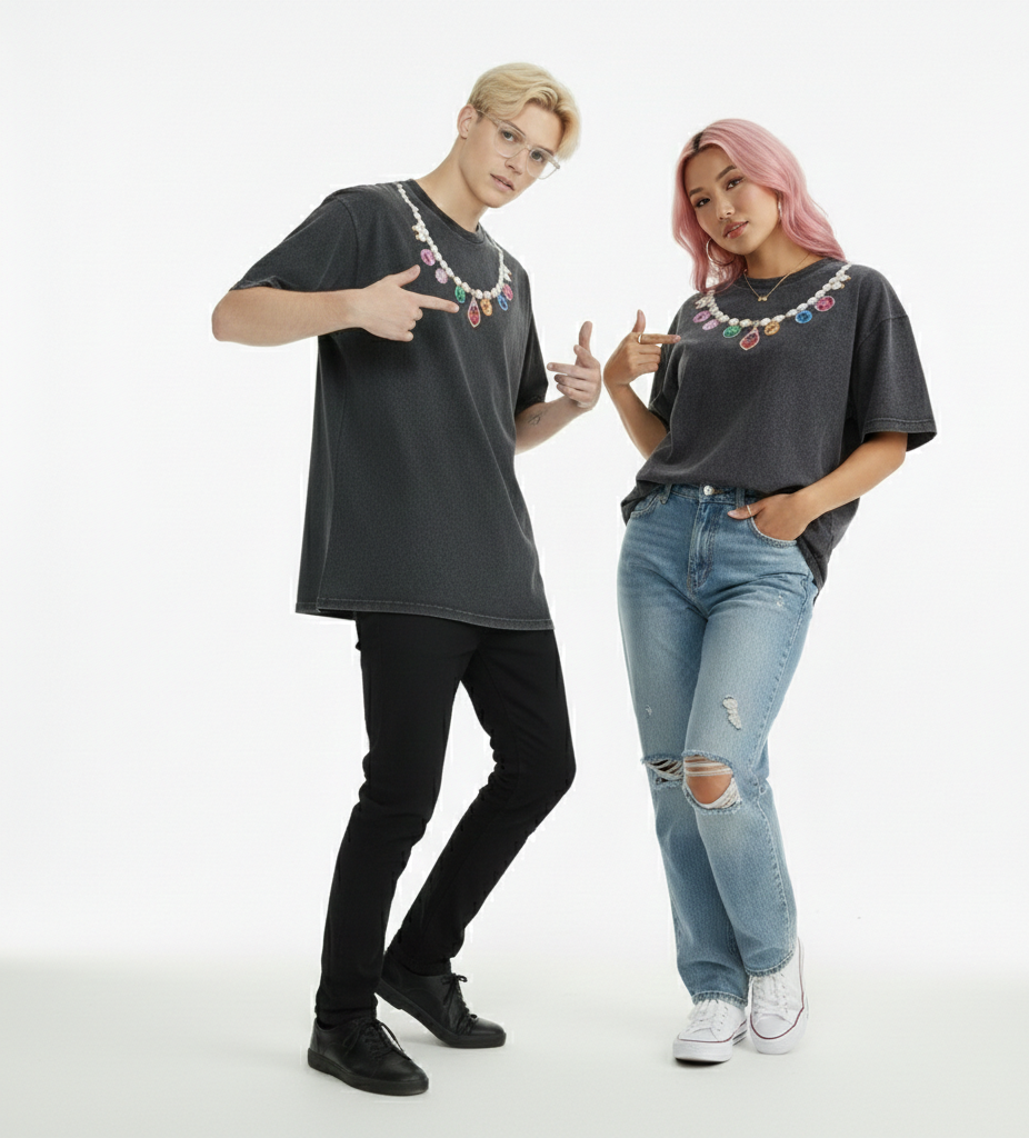 Two people wearing matching dark gray t-shirts and jeans on a white background