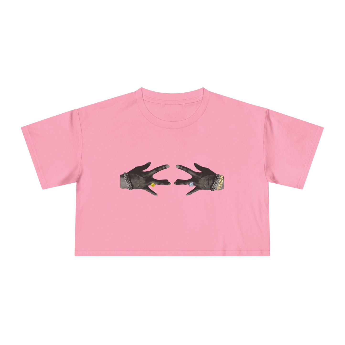 Pink t-shirt with graphic of two hands holding a heart on a white background